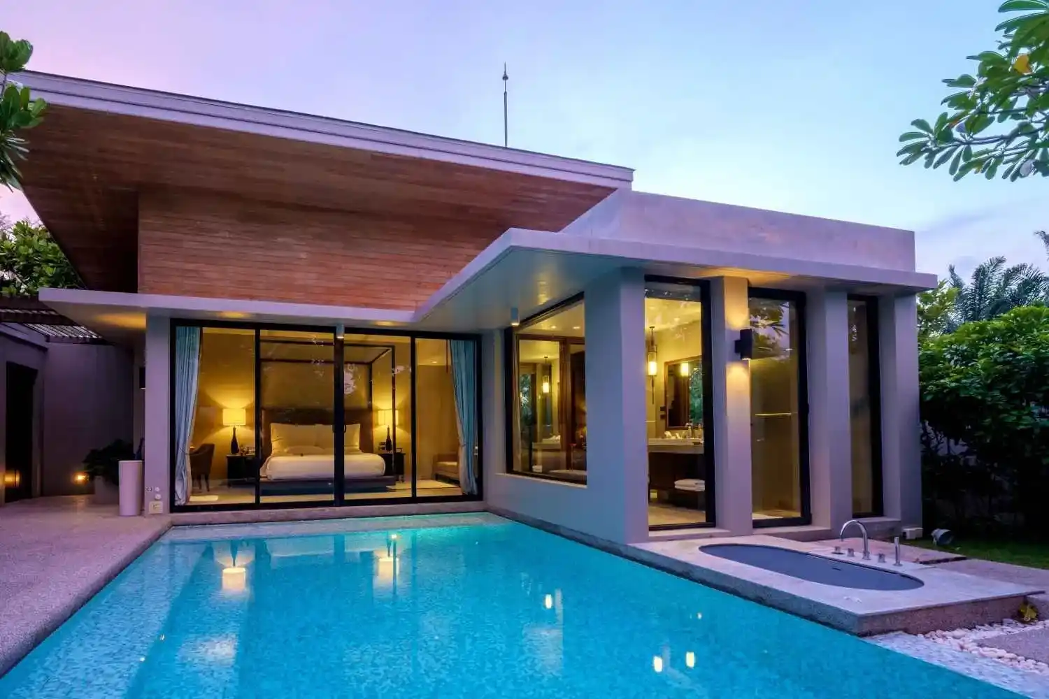 Modern house with a swimming pool, modern pool villa at the beach